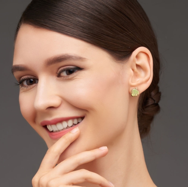 Portrait of beautiful smiling woman with perfect skin